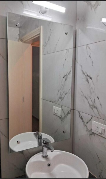Bathroom in 2.5 BHK Apartment at Central Park Cerise Suites, Sohna Sector 33 – for Rent