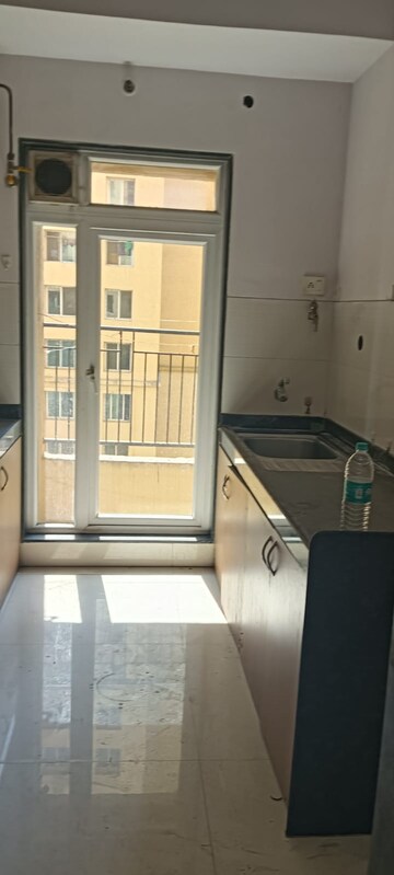 Kitchen in 2 BHK Apartment at Rustomjee Urbania Azziano, Thane West – for Sale