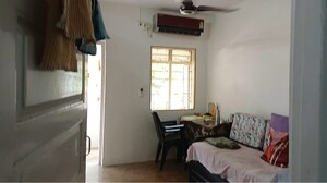 Living Room in 1 BHK Apartment at Shree Kripa Society, Majiwada – for Sale