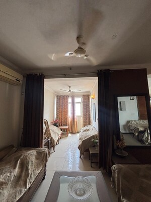 Living Room in 3 BHK Apartment at Aditya Mega City, Vaibhav Khand – for Sale