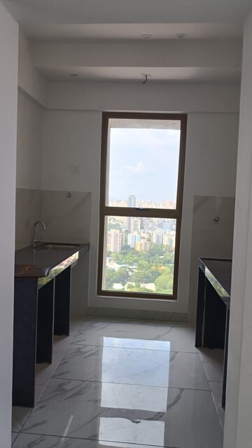 Kitchen in 1 BHK Apartment at Raymond Ten X Habitat, Pokhran Road No Two – for Rent