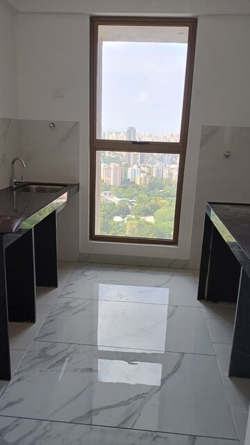 Kitchen in 1 BHK Apartment at Raymond Ten X Habitat, Pokhran Road No Two – for Rent