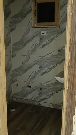 Bathroom in 2 BHK Builder Floor at Shalimar Garden Extension I – for Sale