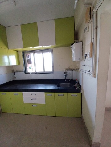 Kitchen in 1 BHK Apartment at Panchratna Heights CHS Kandivali West, Kandivali West – for Rent