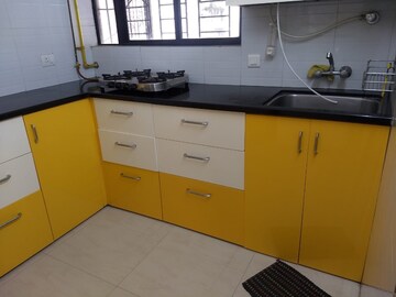 Kitchen in 3 BHK Apartment at Kusum Kunj, Prabhat Road – for Rent
