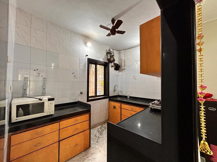 Kitchen, radhika-chs-kopar-khairane 2 Bedroom 1000 Sq.Ft. Apartment In Kopar Khairane Navi Mumbai 8906703