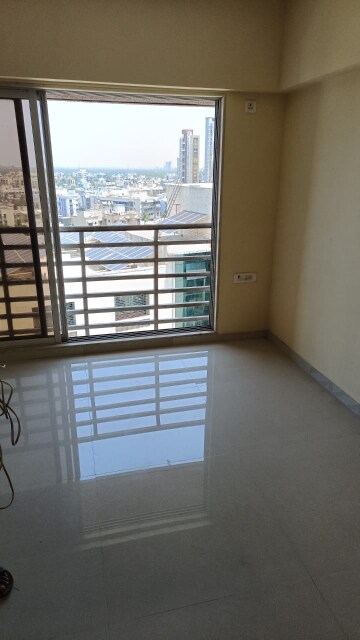 Room in 1 BHK Apartment at Romell Serene, Borivali West – for Rent