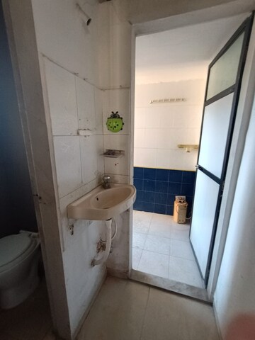 Bathroom in 1 BHK Apartment at Highland Residency CHSL, Balkum Pada – for Sale