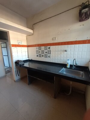Kitchen in 1 BHK Apartment at Highland Residency CHSL, Balkum Pada – for Sale