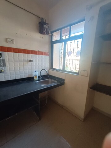 Kitchen in 1 BHK Apartment at Highland Residency CHSL, Balkum Pada – for Sale