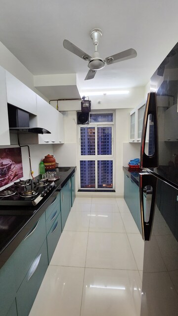Kitchen in 3 BHK Apartment at Godrej Emerald, Ghodbunder Road – for Sale