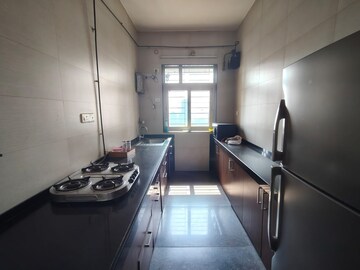 Kitchen in 2 BHK Apartment at Vasant Valley Ivy Tower, Malad East – for Rent