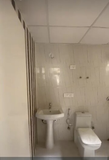 Bathroom in 3 BHK Apartment at Nilaya Greens, Raj Nagar Extension – for Sale