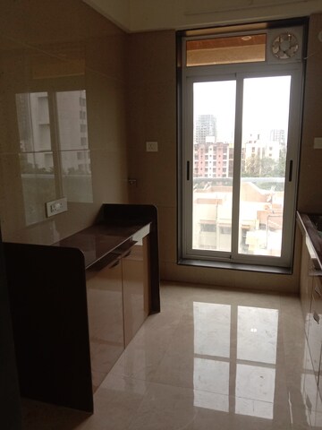 Kitchen in 2 BHK Apartment at Amar Om Vasudev CHS, Borivali West – for Rent