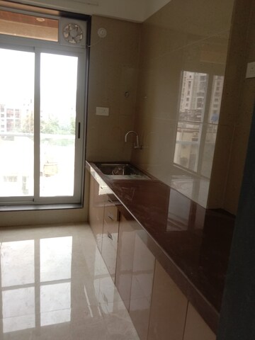 Kitchen in 2 BHK Apartment at Amar Om Vasudev CHS, Borivali West – for Rent