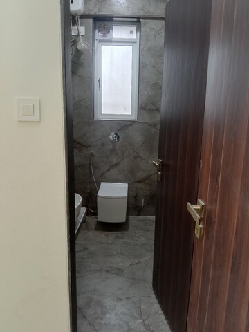 Bathroom in 2 BHK Apartment at Amar Om Vasudev CHS, Borivali West – for Rent