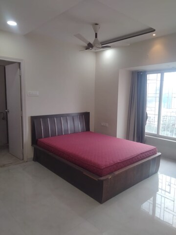 Bedroom in 2 BHK Apartment at Lokhandwala Whispering Palms, Kandivali East – for Rent