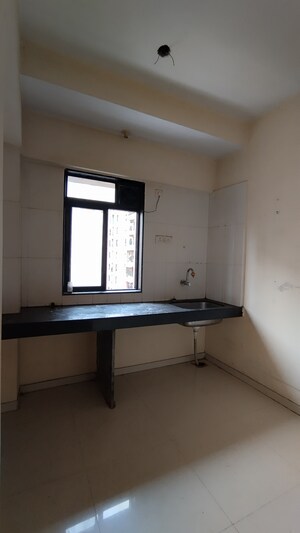 Kitchen in 1 BHK Apartment at Raunak City Phase 2, Kalyan West – for Sale