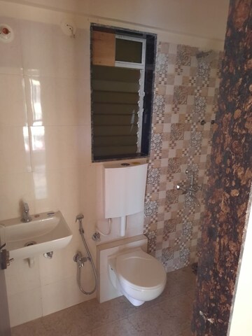 Bathroom in 1 BHK Apartment at Dharti Presidio, Malad West – for Sale