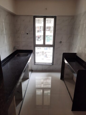 Kitchen in 1 BHK Apartment at Dharti Presidio, Malad West – for Sale