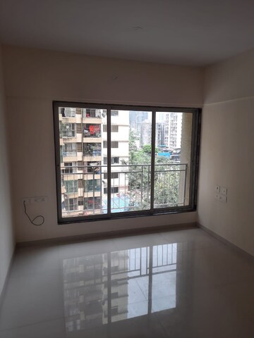 Bedroom in 1 BHK Apartment at Dharti Presidio, Malad West – for Sale