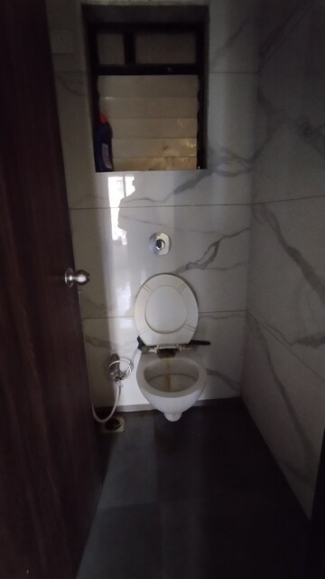 Bathroom in 1 BHK Apartment at Raunak City Sector 4 D4, Kalyan West – for Sale