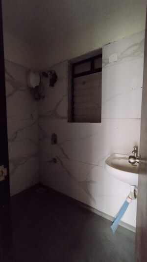Bathroom in 1 BHK Apartment at Raunak City Sector 4 D4, Kalyan West – for Sale