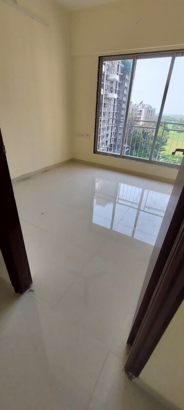Bedroom in 2 BHK Apartment at Dharti Presidio, Malad West – for Sale