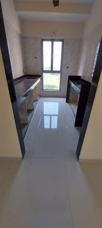 Kitchen in 2 BHK Apartment at Dharti Presidio, Malad West – for Sale