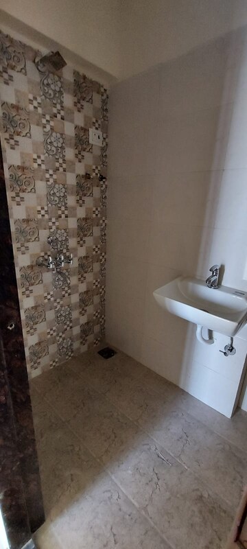 Bathroom in 2 BHK Apartment at Dharti Presidio, Malad West – for Sale