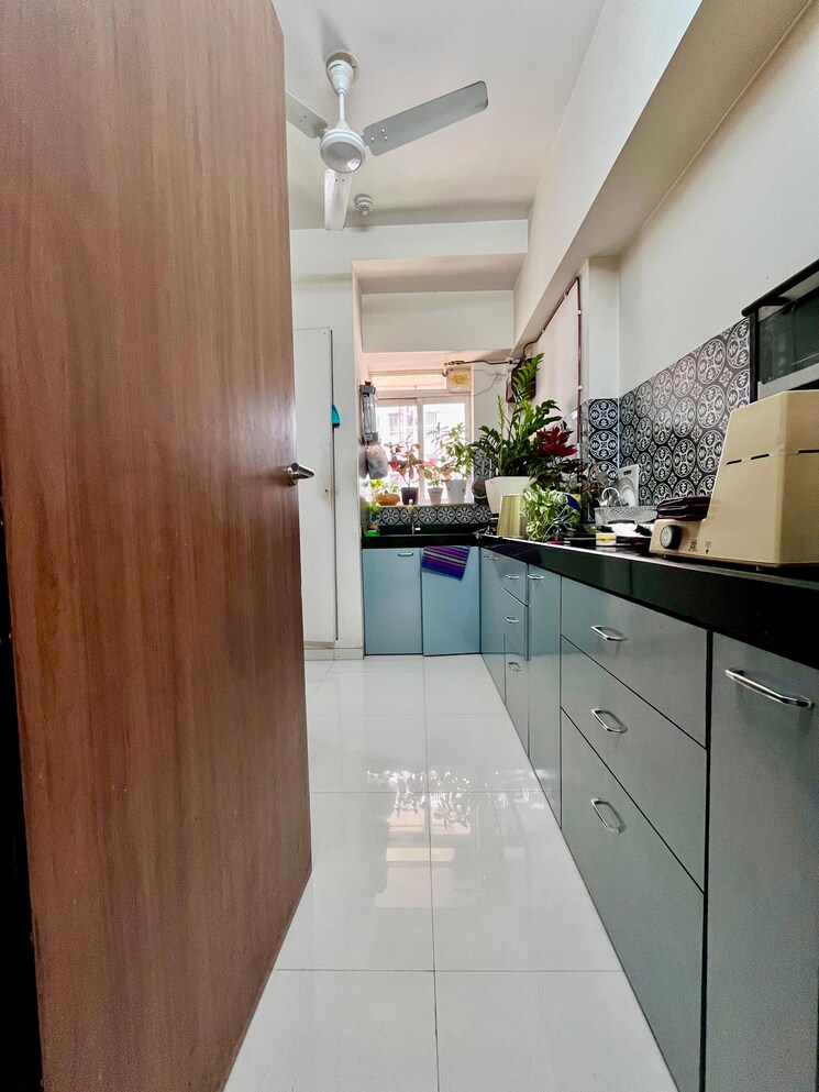 Kitchen, lodha-amara 1.5 Bedroom 650 Sq.Ft. Apartment In Kolshet Road Thane 8907444