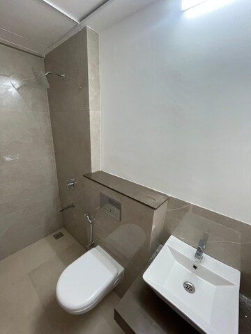 Bathroom in 1 BHK Apartment at Piramal Revanta, Mulund West – for Rent