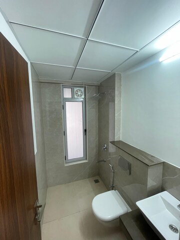 Bathroom in 1 BHK Apartment at Piramal Revanta, Mulund West – for Rent