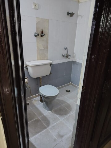 Bathroom in 2 BHK Apartment at Amrapali Royal, Vaibhav Khand – for Rent