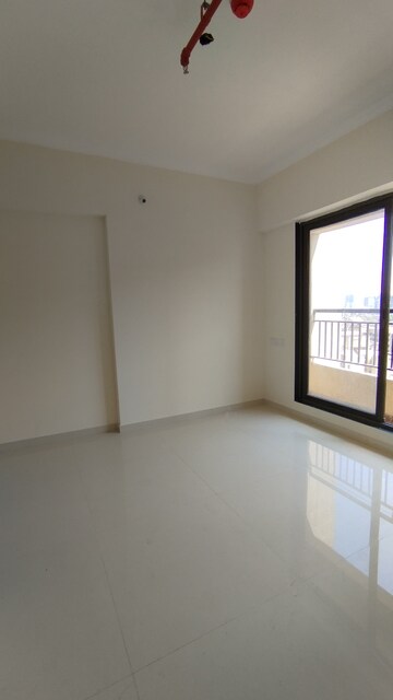 Room in 1 BHK Apartment at Raunak City Sector 4 D4, Kalyan West – for Rent