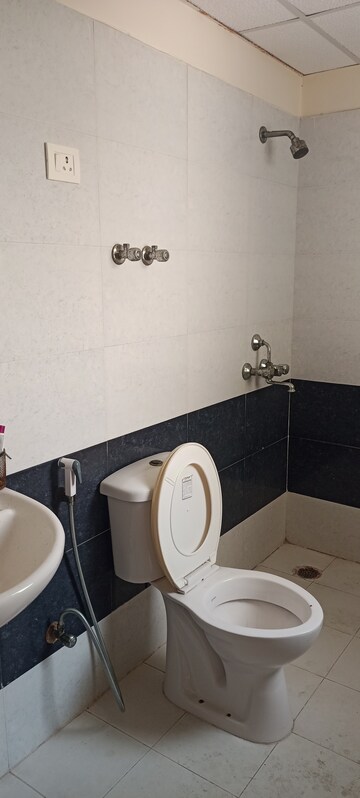 Bathroom in 2 BHK Apartment at Antriksh Golf View, Sector 78 – for Rent