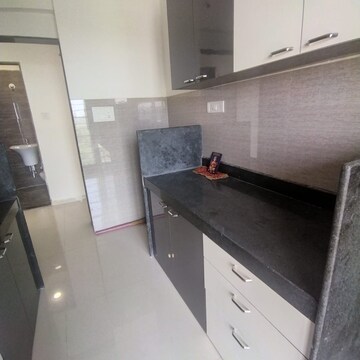 Kitchen in 2 BHK Apartment at Acme Avenue, Kandivali West – for Sale