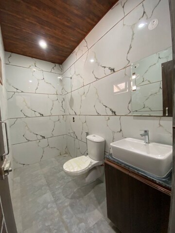 Bathroom in 2 BHK Builder Floor at Sahastradhara Road – for Sale