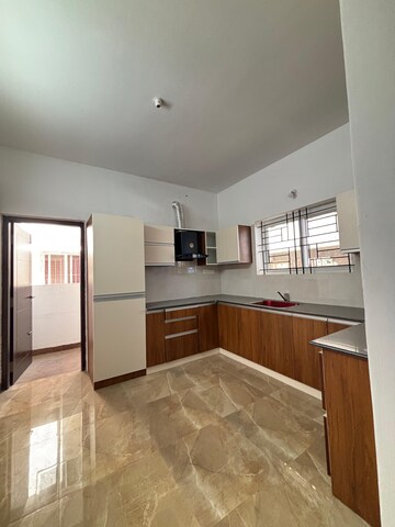 Kitchen in 3 BHK Apartment at RJ Garden, Indiranagar – for Rent