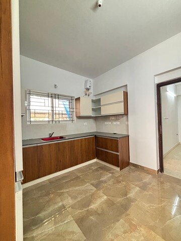 Kitchen in 3 BHK Apartment at RJ Garden, Indiranagar – for Rent