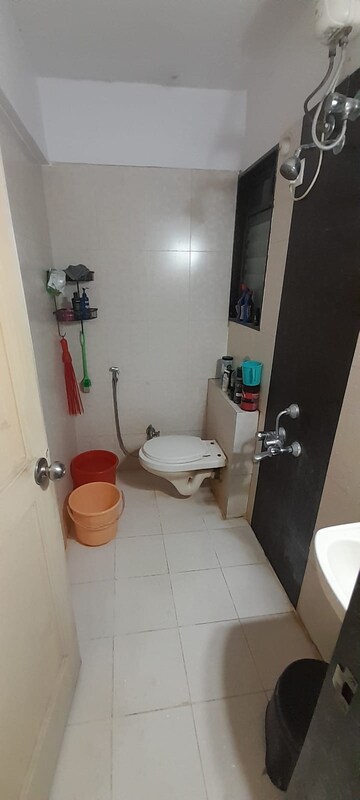 Attached Bathroom in 1.5 BHK Apartment at Dosti Vihar, Samata Nagar – for Sale