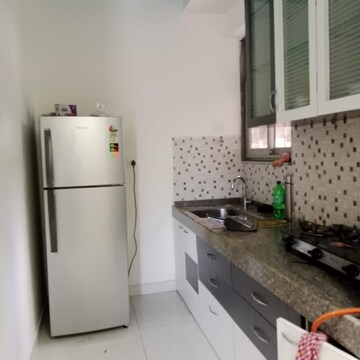 Kitchen in 2 BHK Apartment at Shapoorji Pallonji Astron, Singh Agri Estate – for Rent
