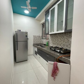 Kitchen in 2 BHK Apartment at Shapoorji Pallonji Astron, Singh Agri Estate – for Rent