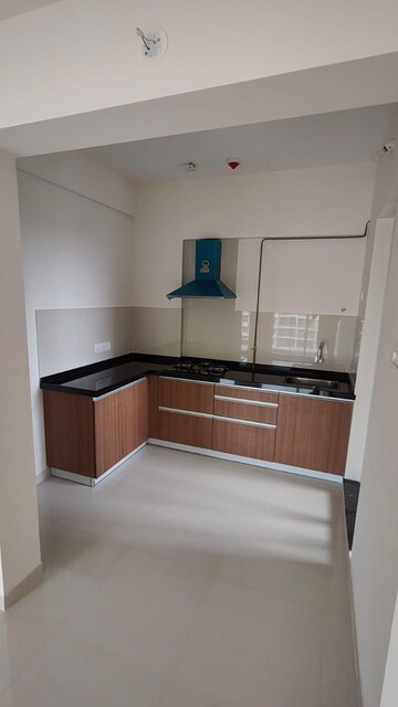 Kitchen in 1 BHK Apartment at Divine Palm Springs, Wakad – for Rent