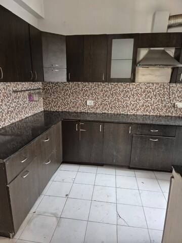 Kitchen in 2 BHK Apartment at Unitech Uniworld Resorts-The Residences, Sector 33 – for Rent