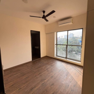 Room in 2 BHK Apartment at DLH Orchid, Lokhandwala Complex – for Sale