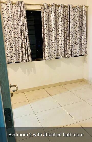 Master Bedroom in 2 BHK Apartment at Windsor Maple Woodz, Wagholi – for Rent