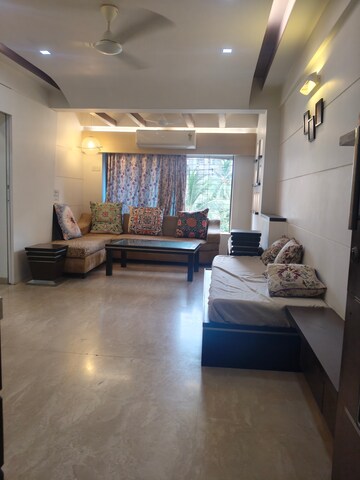Living Room in 2 BHK Apartment at Silver Sand CHS, Andheri West – for Rent