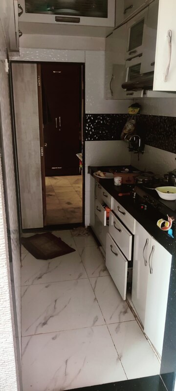 Kitchen in 2 BHK Apartment at Dheeraj Darshan, Jogeshwari East – for Rent