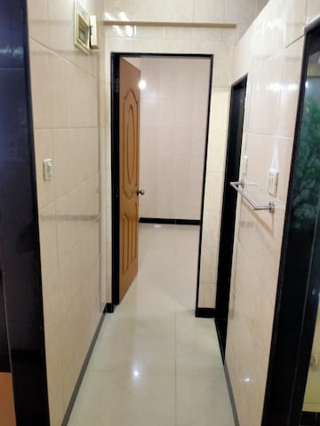 Building Lobby in 1 BHK Apartment at Namo Shanti Dham CHS, Borivali West – for Rent